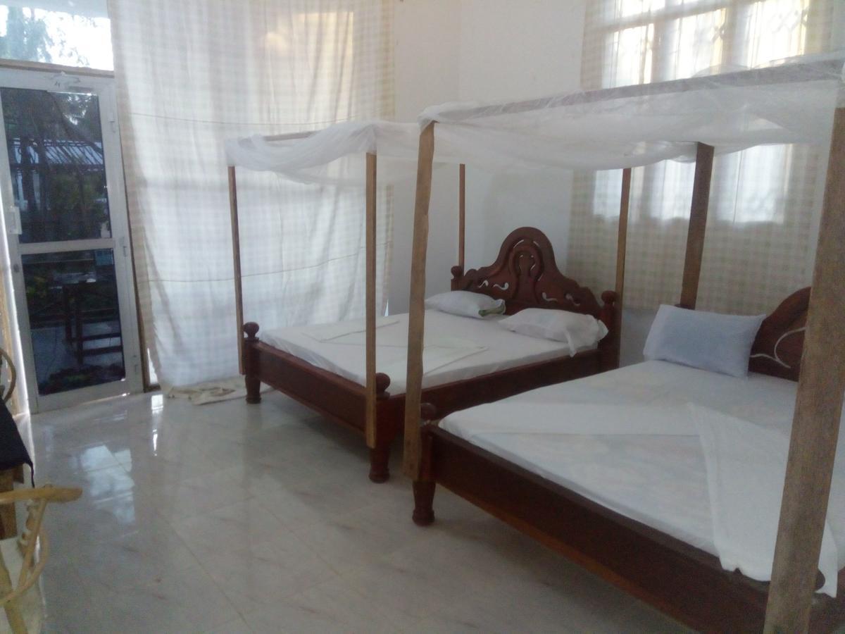 Asiya Beach Bungalow Нунгві Екстер'єр фото